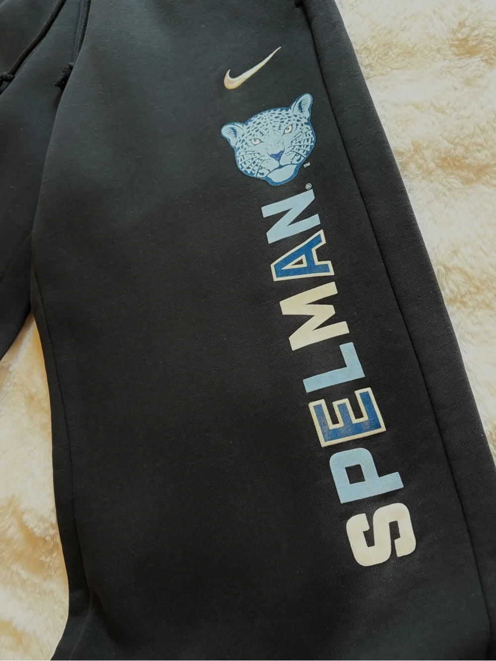 Nike Black Sweatpants with Light Blue Spelman Logo